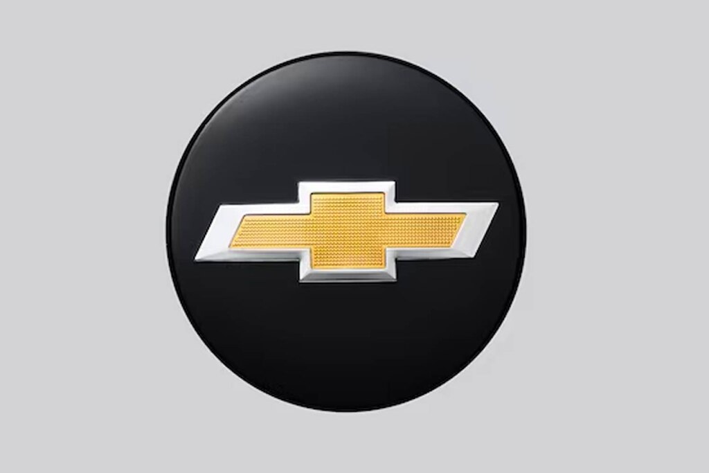 Centro de rin negro con emblema dorado para Chevrolet Suburban 2024